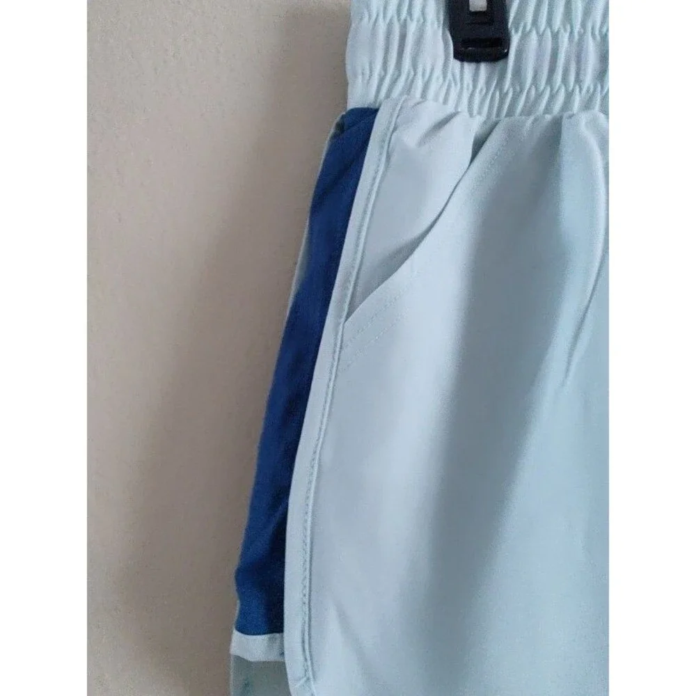 New with tags Women's Reebok Gym Workout Athletic Light Blue Shorts Size L / G